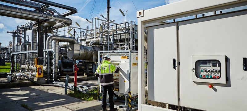 colleague at a projects working the machine